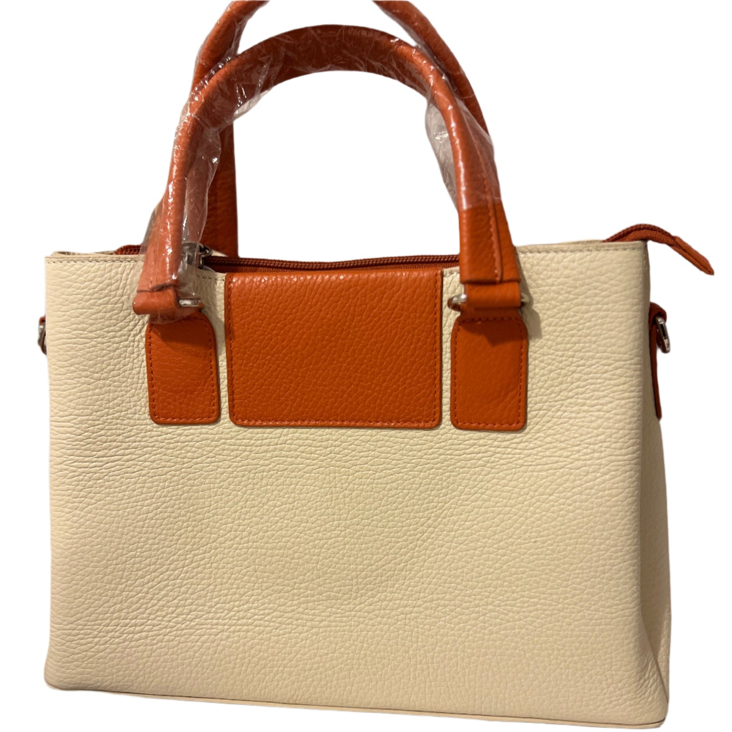Classic Cream Calf Grain Leather Shoulder Bag with Vibrant Orange Accents.